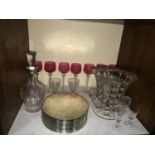 SECTION 6. A set of seven cranberry wine glasses with etched initial 'L', raised on ribbed