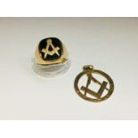 A 9ct yellow gold and onyx Masonic signet ring, weighs 5.2 grams, finger size Q. Together with a 9ct