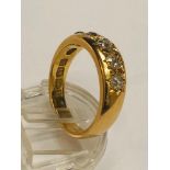 A gents 18ct yellow gold diamond ring, set with five old Victorian cut diamonds in a star setting,