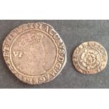 A James 1 penny and a sixpence. The penny is Third Coinage (1619-25), but the sixpence is earlier (