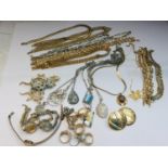 A large assortment of costume jewellery including six various coloured metal necklaces, five