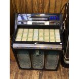 A 1979 Rock-Ola 477 Max jukebox, digital microcomputer stereophonic music system' light up digital
