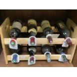 Eight assorted bottle of wine including a 1994 Chateau La Rose Du Pin Bordeaux, a 1994 Domaine De