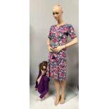 A life size female mannequin, together with a female mannequin torso and head