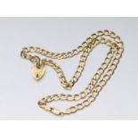 A 9ct yellow gold curb link chain, weighs 25.6 grams, measures 22 inches in length.