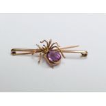 A 9ct gold and Amethyst spider brooch, weighs 10.0 grams, the oval cut Amethyst measuring