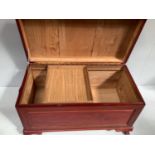 A large oriental stained hardwood blanket box / storage chest with camphor wood lining, with brass