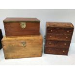 A walnut jewellery chest with dome cover opening to reveal a lift-out compartmented shelf, the front