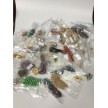 A large selection of assorted costume jewellery including an iridescent bead necklace, a turquoise