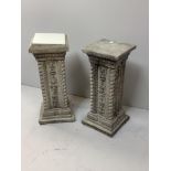 A pair of square reconstituted stone garden pedestals with central floral motifs and beaded edges,
