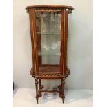 A reproduction French Display Cabinet Vitrine Gilt Ormolu With single glazed door, two glass shelves