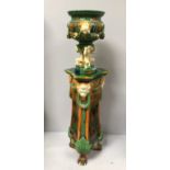 A large majolica style jardiniere and stand in the style of Albert-Ernest Carrier-Belleuse, with