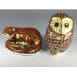 Two Royal Crown Derby porcelain paperweights including 'Otter' and an owl, owl measures 11cm tall