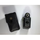 A Coronet Midget 16mm miniature camera, in black Bakelite case, with original black leather case