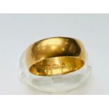 A 22ct gold wedding ring, weighs 5.9 grams, finger size P.