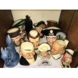 SECTION 23. Ten various character jugs including five Royal Doulton, together with a blue Wade