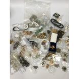 A large selection of costume jewellery including a yellow metal galleon brooch, a French jet brooch,