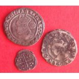 Three silver Elizabeth 1 pieces a 1576 threepence with rose and an eglantine mintmark; a halfgroat