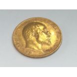 An Edward VII half sovereign, 1910, obv bare head, rv George & Dragon, Weight 3.95g.