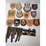 Royal Navy interest: Thirteen various ship's crests mounted on wooden plaques, including