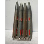 A set of four post-WWII Bofors 40mm drill rounds in clip, marked to bases N2 Drill 1953, 1954 & 2