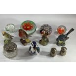 A mixed collection of four paper weights, four Beswick birds, a Royal Crown Derby duck, a silver