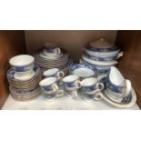 SECTION. 6 A Wedgwood Blue Siam 8 place dinner service including two Tureens, gravy boat, meat