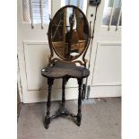 A carved and stained wood occasional table / jardiniere stand with top in the shape of a four leaf