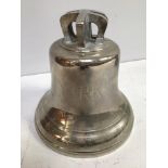 A large chrome plated brass maritime style bell, engraved with broad arrow and 'York', indistinct