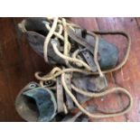 A pair of Siebe Gorman style diving boots with brown leather uppers, three buckled leather straps