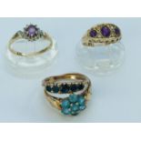 Four 9ct yellow gold rings, set with various coloured stones, total weight 10.1 grams.