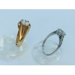 Two 9ct gold dress rings, set with white stones, total weight 5.2 grams.