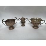 Three various silver two-handled trophies, each with engraving, two for the Karachi Golf Club, gross
