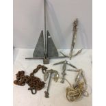 Five various modern galvanised boat anchors and a length of heavy chain