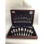 A 44 piece cutlery set by Guy Degrenne comprising of six place settings including two serving spoons