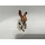 A silver and enamel figure of a hare, probably by Saturno, with enamelled head and silver body,