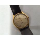 An Omega De Ville quartz wristwatch, model 1336, the textured dial with applied gilt batons denoting