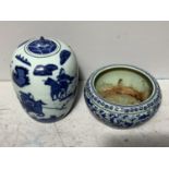 A Chinese blue and white porcelain ginger jar and cover, the sides decorated with scenes of warriors