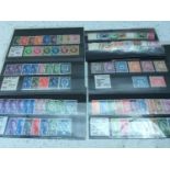 A small quantity of dealers stock cards with QV mint Penny Reds, Geo. VI and ERII definitive mint