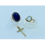 A 9ct gold dress ring set with an oval cabochon lapis lazuli stone, weighs 3.6 grams, finger size M.