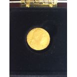 A George III Shield Guinea, 1777, 22ct gold, Obv. Fourth head, Rev. crowned shield, 8.36g, good