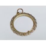 A 9ct yellow gold Kruggerand mount with filigree edging, weighs 9.4 grams, measures 18mm in