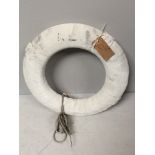 An original canvas-covered cork lifebuoy, 60cm