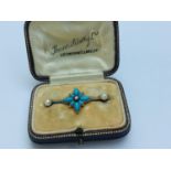An unmarked gold turquoise diamond and pearl bar-brooch modelled as a flower, weighing 2.7 grams, in