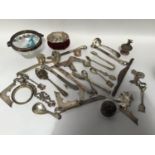 A small collection of assorted silver items comprising picture frame mounts, a necklace, silver-