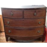 A 19th century mahogany bow front chest of two short, over two long graduated drawers, raised on