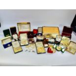 A selection of costume jewellery including various rolled gold lockets etc and brooches and rings