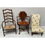 An Edwardian oval shaped Captains chair by Jenks & Wood, mahogany frame with scrolled arms, shield