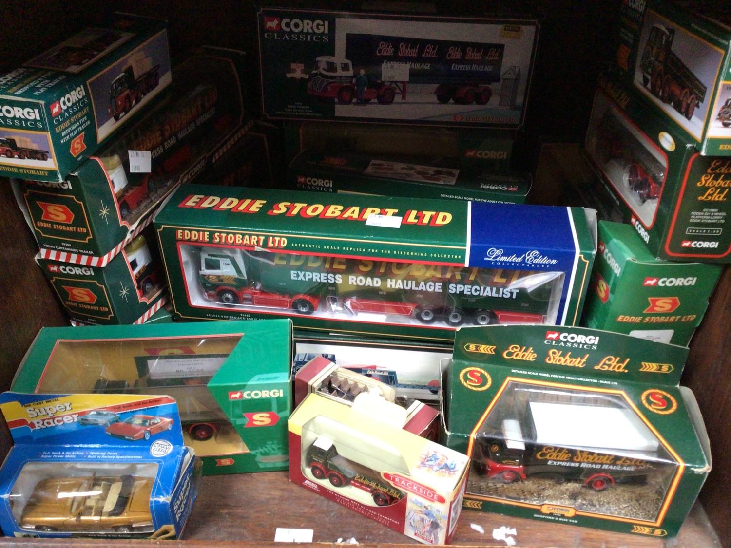 SECTION 36. A collection of 21 assorted boxed die-cast vehicles, predominantly Corgi Eddie Stobart