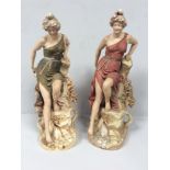 Two matching Royal Dux porcelain figural spill vases modelled as classical maidens, each sat atop